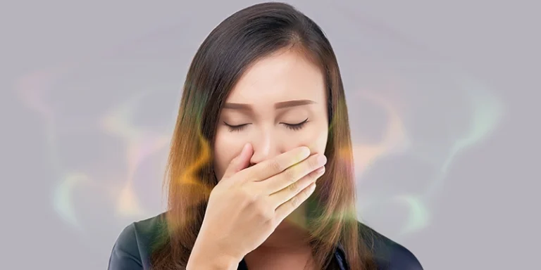 kitchen sink smell - Why Does My Kitchen Sink Smell? - woman holding nose