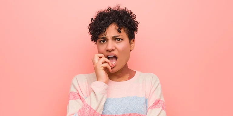 toilet is overflowing - Your Toilet is Overflowing – What Now? - concerned woman pink background