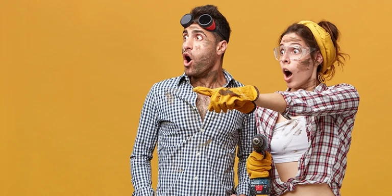home repair - Home Repairs You Shouldn’t Tackle Yourself - two people with astonished looks in work clothes