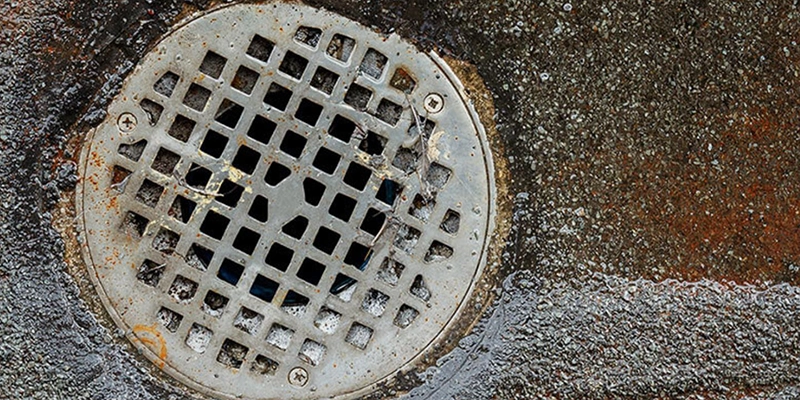 sewer - Is Sewer Gas Dangerous? - exterior drain with protective grate