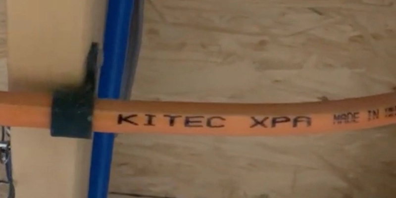 kitec plumbing - How to Tell When to Replace Kitec Plumbing - kitec orange pipe showing the kitec name in black