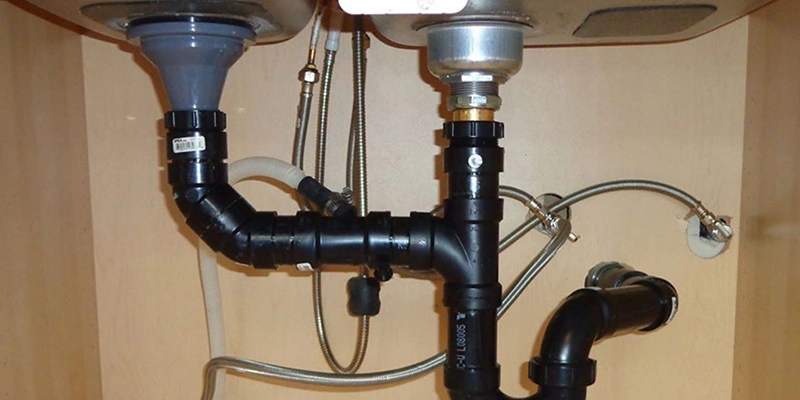 gurgle - fix kitchen sink - view of undersink plumbing