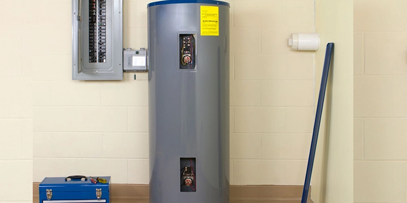 water heaters - What factors affect the life expectancy of your hot water heater? - grey water heater on floor